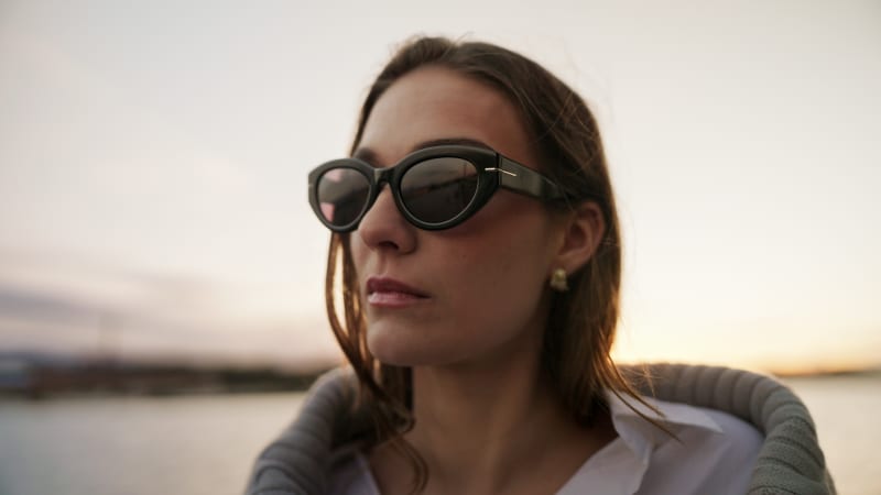 A close-up of Vind CJ2431 sunglasses, highlighting their sculpted shape and bold design against a softly blurred backdrop.